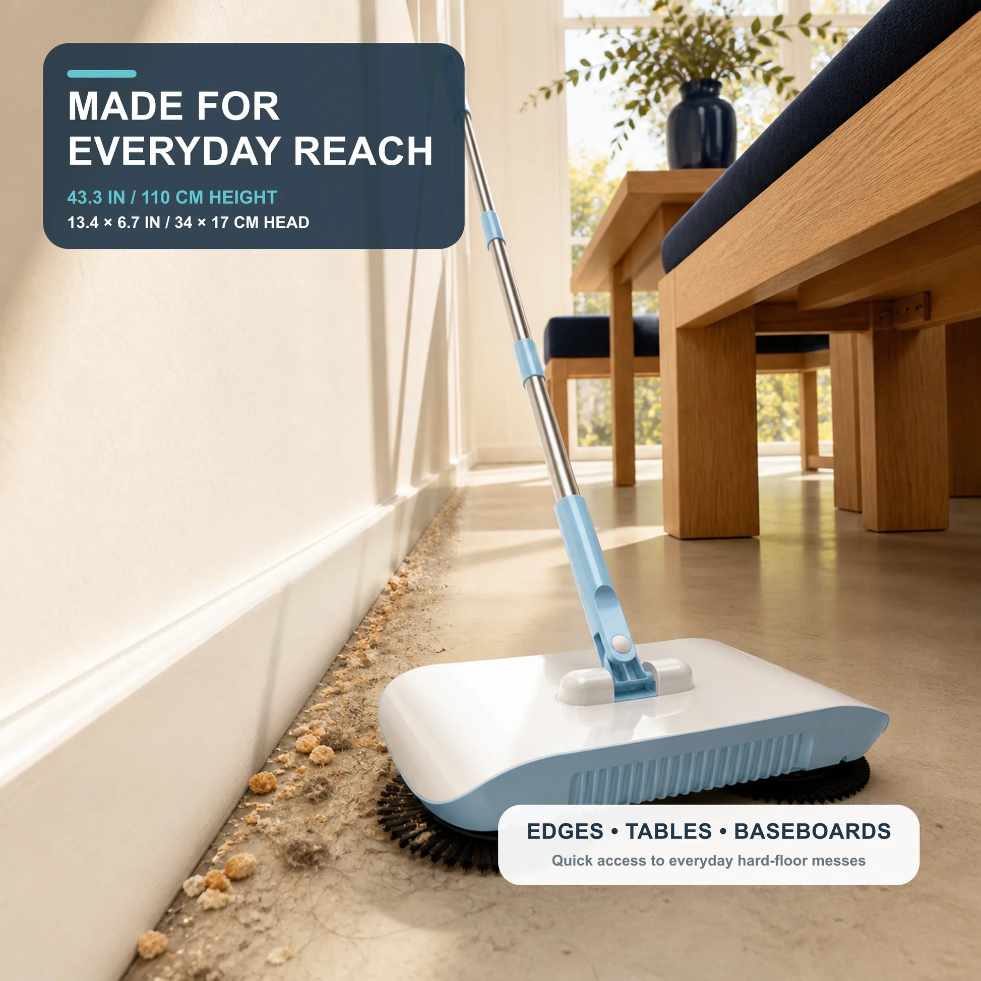 Full-size manual sweeper cleaning beside a baseboard and dining table